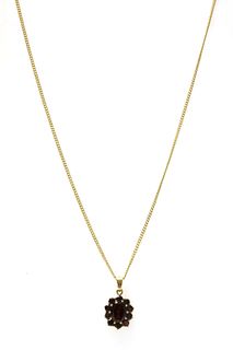 A 9ct gold garnet cluster pendant,