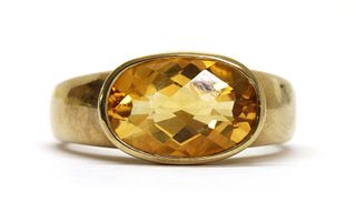 A 9ct gold single stone citrine ring,