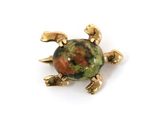 A gold tortoise brooch,