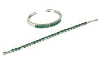 A silver emerald set bracelet,