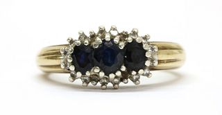 A 9ct gold sapphire and diamond triple cluster ring,