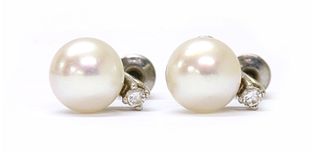 A pair of white gold cultured pearl and diamond stud earrings,
