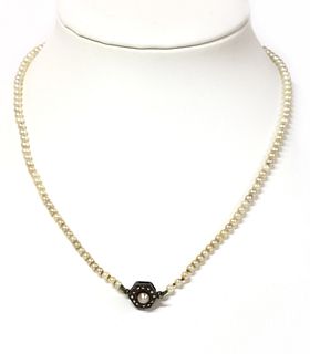 Two single row graduated cultured pearl necklaces,
