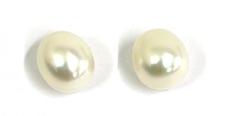 Two unmounted, undrilled cultured South Sea pearls,