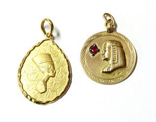 A gold Nefertiti pendant,