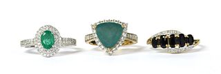A 9ct white gold emerald and zircon cluster ring,