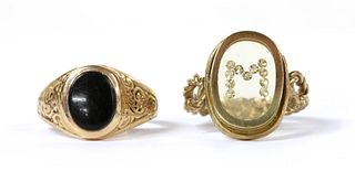 A gold diamond and resin set initial 'M' ring,