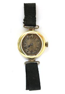 A ladies' 18ct gold mechanical strap watch,