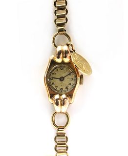 A ladies’ 9ct gold mechanical bracelet watch,