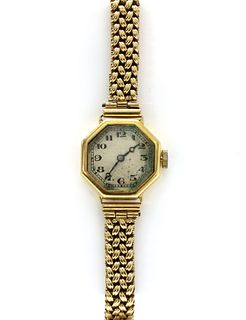 A ladies’ gold mechanical bracelet watch,