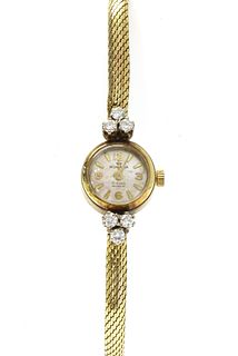 A ladies' gold Romana diamond set cocktail watch,