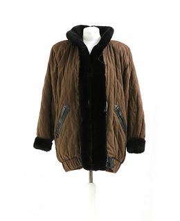 A Yves Saint Lauren padded, faux fur lined, long jacket,