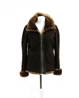 An Armani brown Orylag furlined short jacket,