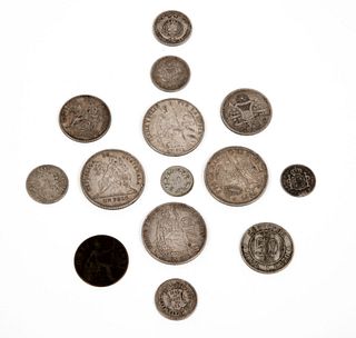 Lote de monedas del Siglo XIX. Guatemala, Chile, Perú Inglaterra y otros. Elaboradas en plata y metal. Piezas: 14