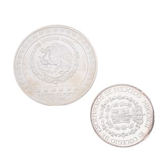 Dos monedas en plata .999 y .925. 5 onzas PIEDAD DE TIZOC y Colegio de Notarios del Distrito Federal. Peso:  218.2 g.