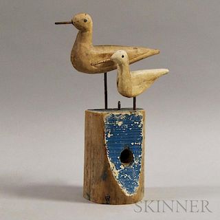 Two Carved and Painted Shorebirds on a Blue Post