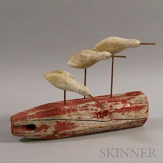 Three Carved and Painted Shorebirds on a Red Post
