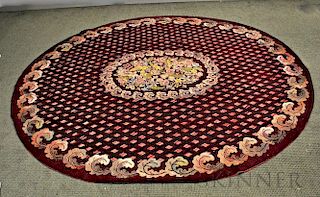 Room-sized Oval Hooked Rug