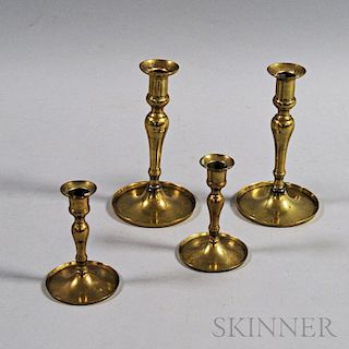 Two Pairs of Turned Brass Candlesticks
