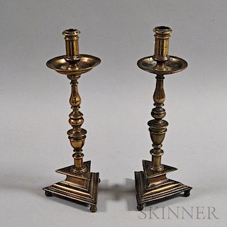 Near Pair of Turned Brass Footed Candlesticks