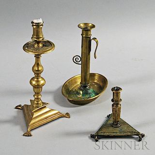 Three Brass Lighting Devices