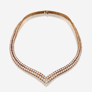 A diamond and eighteen karat gold necklace