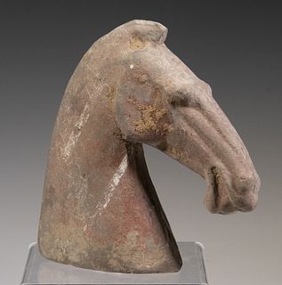 CHINESE HAN DYNASTY POTTERY OF A HORSE'S HEAD (206 BC - 220 AD)