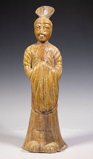 CHINESE TANG DYNASTY LARGE STONEWARE FIGURE OF AN ATTENDANT