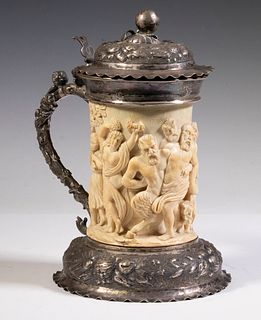 A SCARCE GERMAN SILVER 19TH C. COVERED STEIN WITH RELIEF DECORATION TO IVY BODY