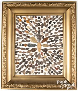 Four framed flint and stone points and arrowheads