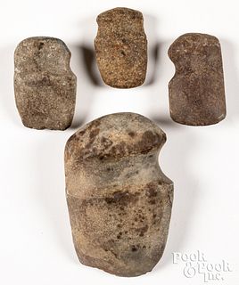 Four Native American Indian stone axe heads