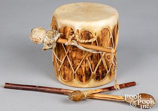 Cochiti Indian hide drum, having drumsticks