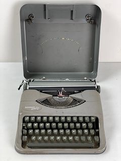 A Vintage Hermes Baly Typewriter with Case