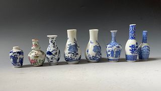 A group of miniature porcelain vases
