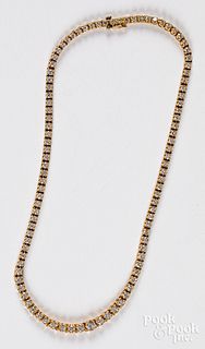 14K gold and diamond necklace, 21.7dwt.