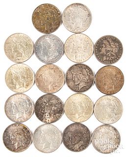 Eighteen silver dollars