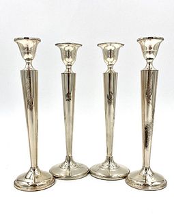Two Pairs of Weighted Sterling Silver Candlesticks