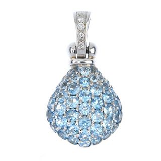 An 18ct gold aquamarine and diamond pendant. The pave-set aquamarine pear-shape cluster, to the grad