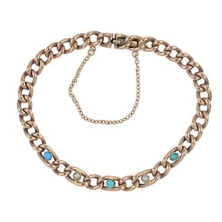 An early 20th century 9ct gold gem-set bracelet. The curb-link chain, with circular turquoise caboch