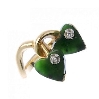 A nephrite jade and diamond dress ring. The two heart-shape nephrite jade panels, each with single-c