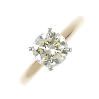 <p>A diamond single-stone ring. The brilliant-cut diamond, to the plain band. Estimated diamond weig