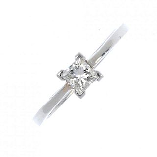 A platinum diamond single-stone ring. The square-shape diamond, to the plain band. Estimated diamond