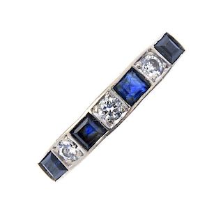 An 18ct gold sapphire and diamond half-circle eternity ring. The alternating square-shape sapphire a
