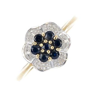 A sapphire and diamond cluster ring. The circular-shape sapphire cluster, within a single-cut diamon