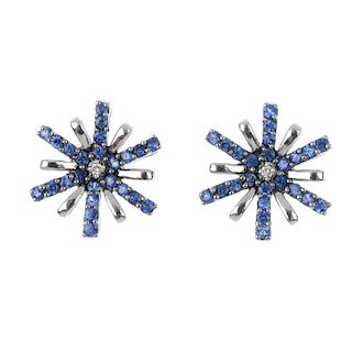 A pair sapphire and diamond ear studs. Each designed as alternating circular-shape sapphire and poli