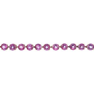 A topaz bracelet. Designed as a series of circular-shape coated pink topaz links, to the heart-shape