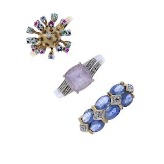 A selection of three gem-set and diamond rings. To include a ruby, emerald and sapphire articulated