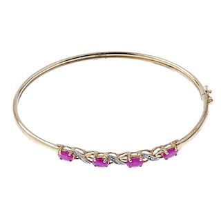 A gem-set bangle and a bracelet. To include an oval-shape sapphire bracelet with single-cut diamond
