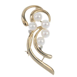 A 9ct gold cultured pearl and diamond brooch. The cultured pearls, with brilliant-cut diamond highli