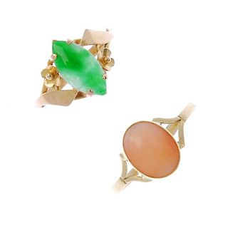 Two gem-set rings. To include a marquise-shape jade cabochon ring with floral highlights, together w